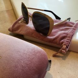 New authentic Miu Miu sunglasses in a metal frame