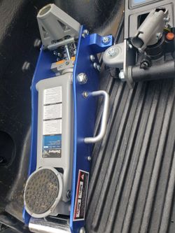 hydraulic floor jack — looks like a lower-profile/high-lift style DieHard Aluminum Steel Floor Jack.