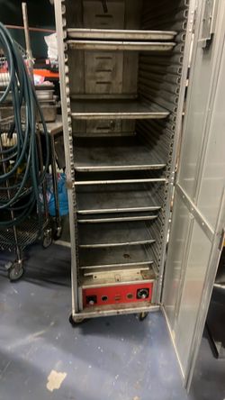 Food warming cabinet on wheels