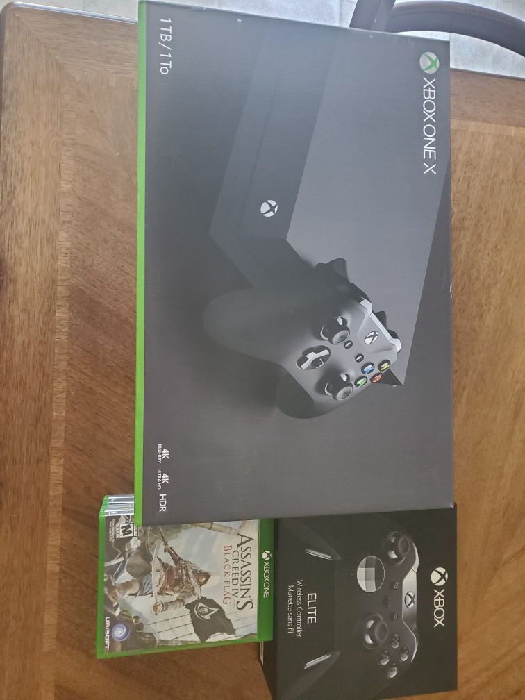 Xbox One (Like new condition with box) with Elite controller (like new condition with box) And six games