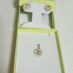 Set Of Gold Earrings And Charm