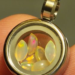 New - 15mm Pendant Filled With Natural Ethiopian Fire Opal Crystals Cabachon Flatbacks Marquise Cut 