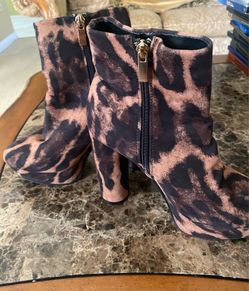 Animal print boot heels size 7