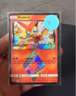 Victini prism star dragon majesty pokemon card