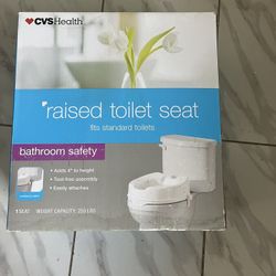 New raised toilet seat (white) fits standard toilets 