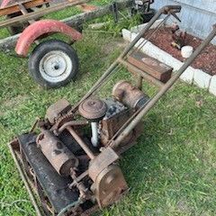 The Locke and Chain Walkbehind  Lawn mower