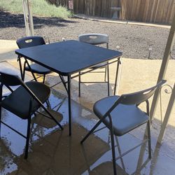 Table With Folding Chairs 