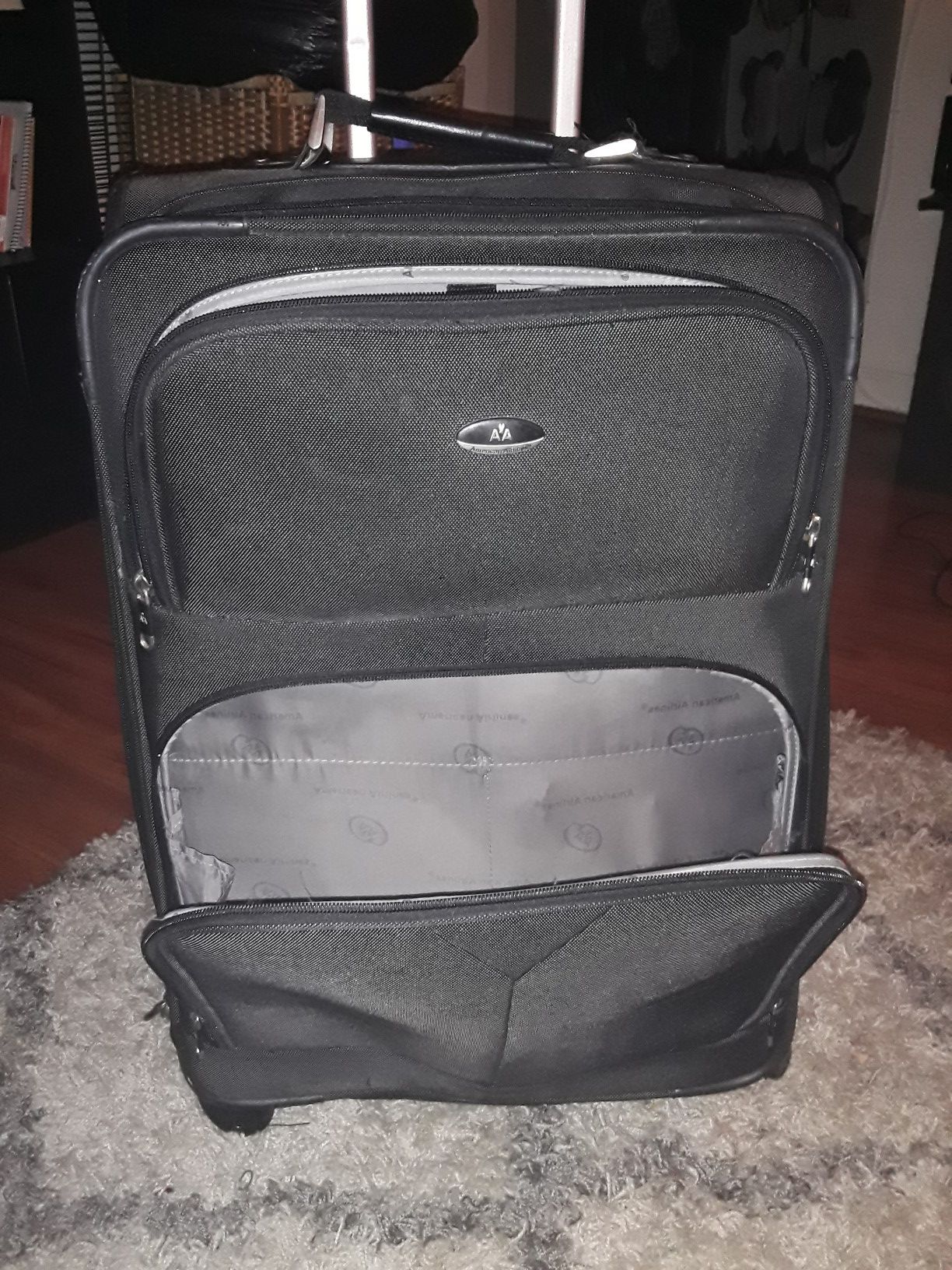 Black luggage rolling bag