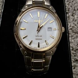 Seiko Solar Quartz Wristwatch 100M Stainless Steel Date Indicator Gold Silver