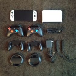 NINTENDO SWITCH OLED (MODDED) with 125 SWITCH GAMES AND 7000 RETRO GAMES AND MANY EXTRAS