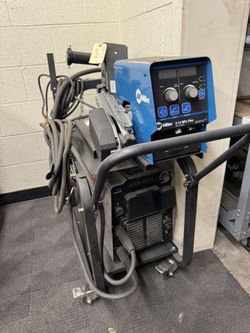 Miller XMT with Top Feeder