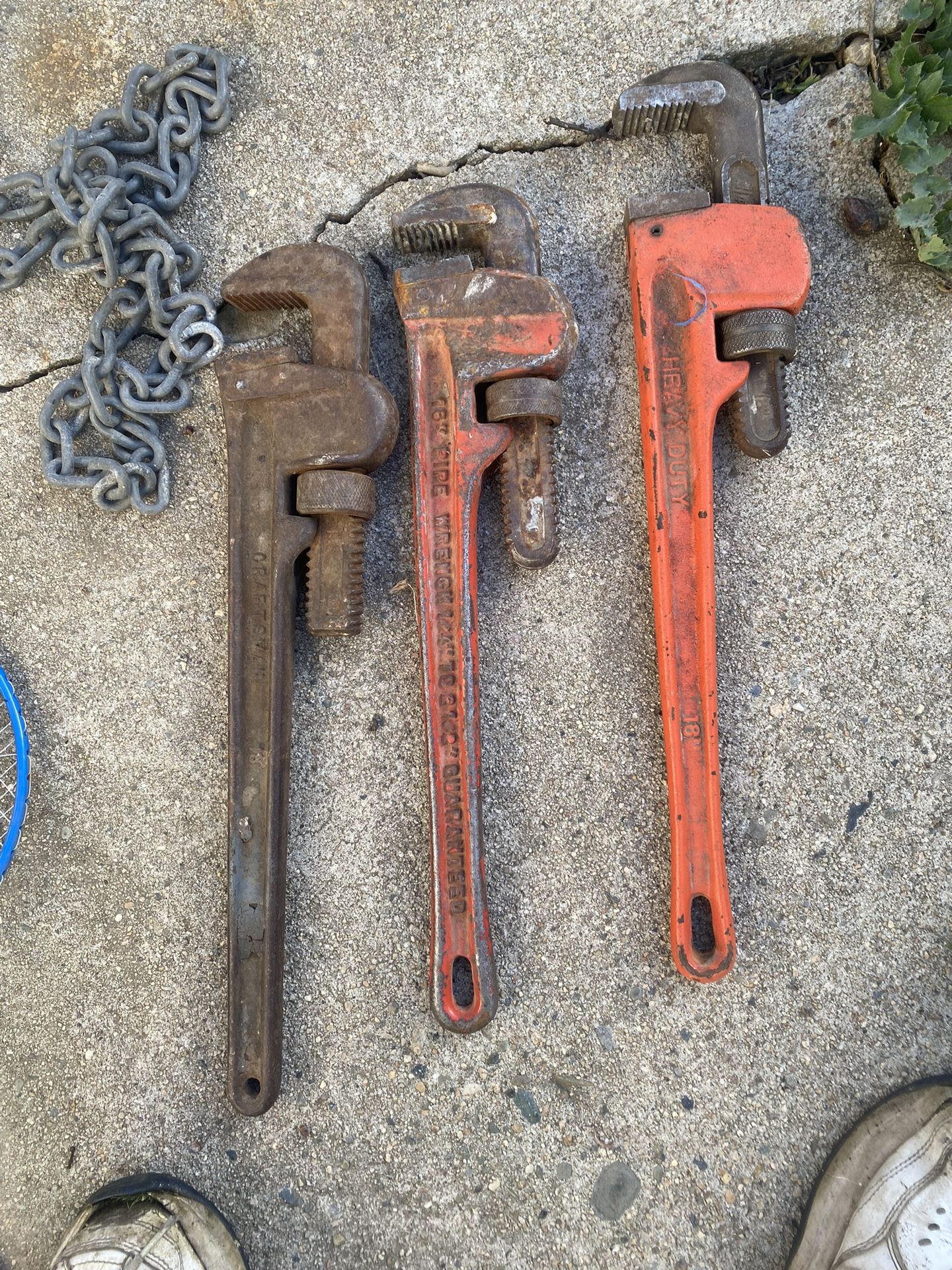 Three pipe wrenches