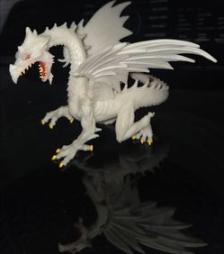 Safari Ltd. Glow-in-the-Dark Snow Dragon Figurine - Detailed 6" Model Figure
(small incense burn on tail )
