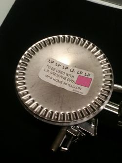 Lp burner with electric ignitor