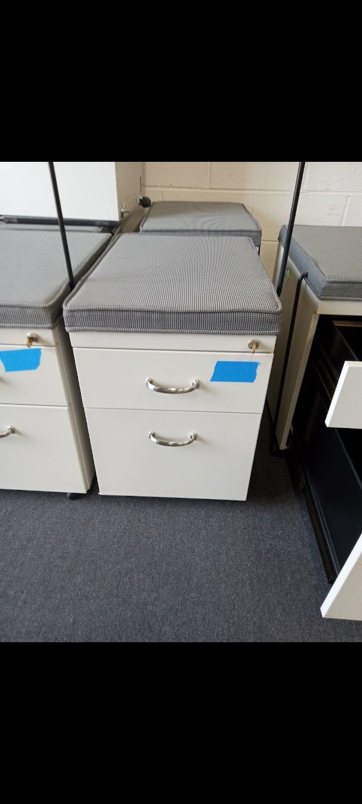 Two Drawer File Cabinet With Key Sit On Cushion And Wheels Handle For Easy Movement