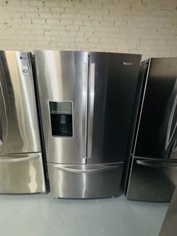 Whirlpool stainless steel refrigerator (36" x 69" x 29") with a receipt for a 90-day warranty.