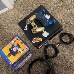 Ps4 with games, headset, and controllers