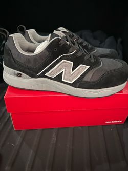 Men’s 8.5 New Balance Black and Grey Sneakers