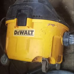 A Large Dewalt Shop Vac Works Good.