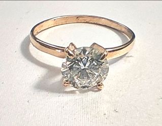 Exquisite 1 Carat Diamond Set in a Gold Solitaire Ring