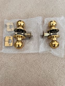 Polished brass spherical doorknob sets - $20 Each