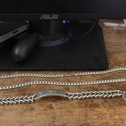 Silver chain and ID bracelet — $300 Long silver chain — $300