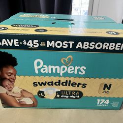 Newborn diapers w/ clothes