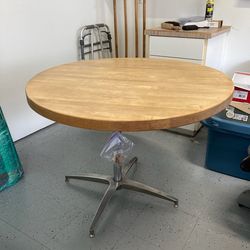 Post modern round maple butcher block dining table on chrome base
Butcher block table 48"