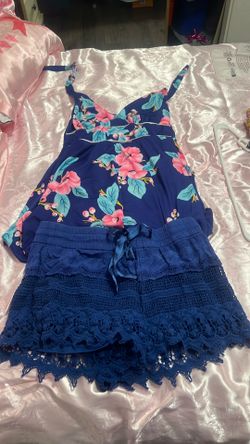 A thing suit with lace shorts