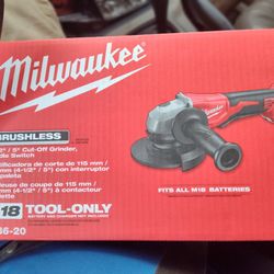Milwaukee M18 Red Lithium XC 5.0 Battery 2 With The Charger And An Impact Drill Just The Two And A Brushless Four And A Half To 5 In Cut Off Grinder 