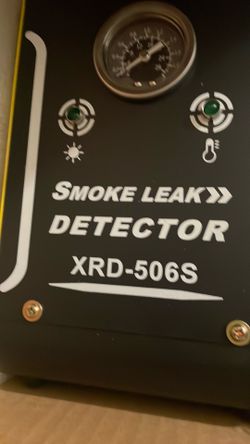 Smoke leak detector