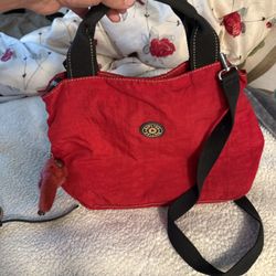 Kipling Red Messenger crossbody Bag with Adjustable Straps and Sporty Design