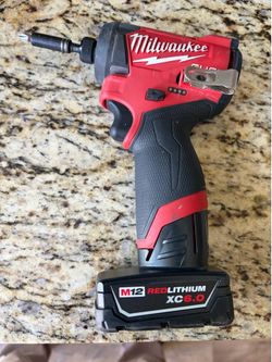 M12 fuel 1/4” Hex Impact Drill Milwaukee with 6.0 XC battery - like new condition