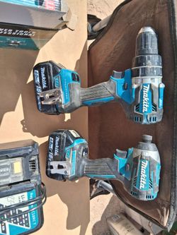 18V Makita drill set with 4.0 batteries. Batteries hold a very good charge. Will add the almost new router also.