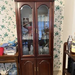 REDUCED To $85- China display cabinets with glass doors and brass-tone hardware. 