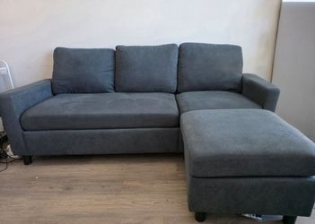 Gray couch with detachable ottoman