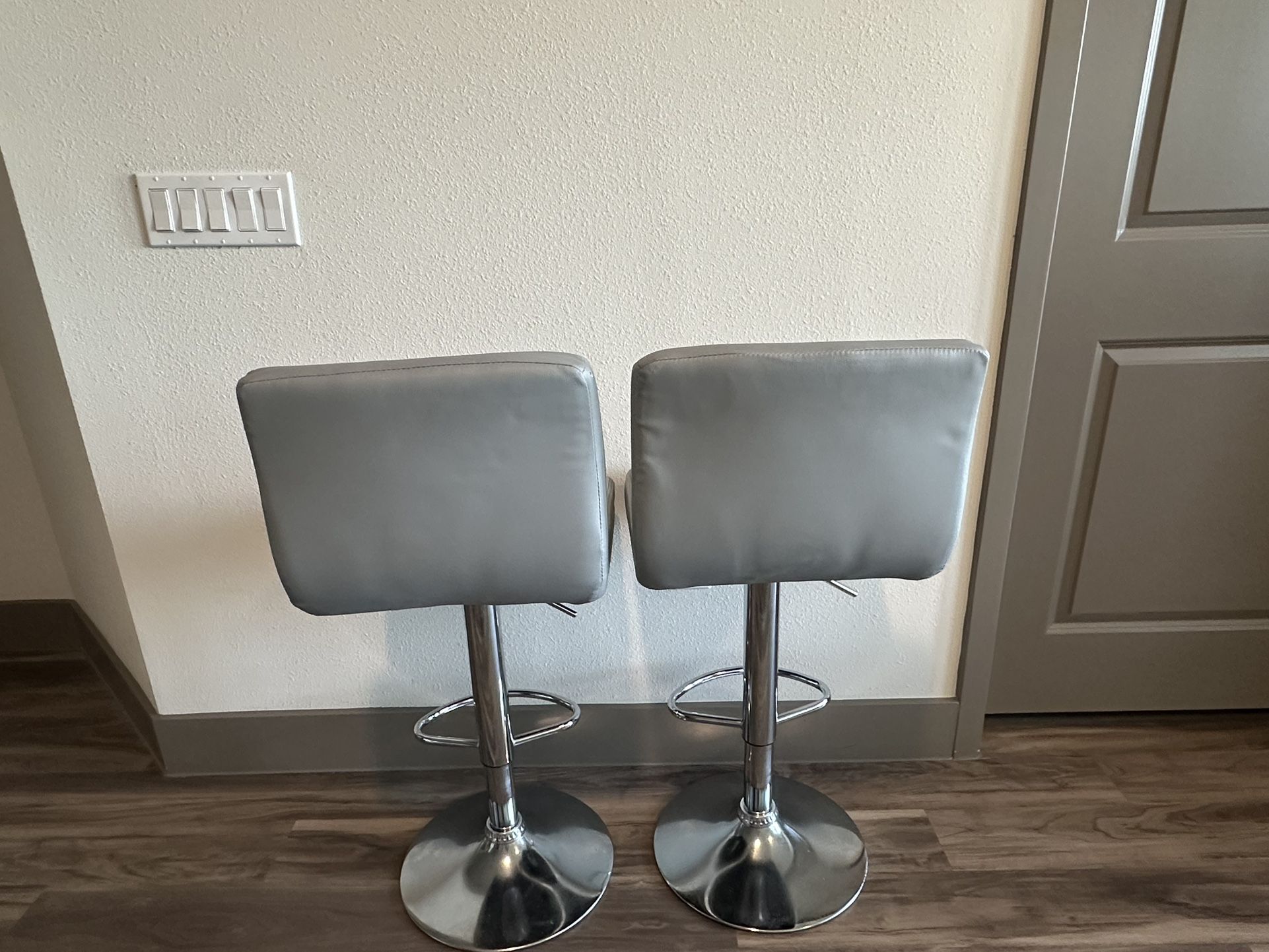 $700 for bedroom set.  $700 for couch.  $100 for tv stand. $300 for tv.  $20 for barstools.