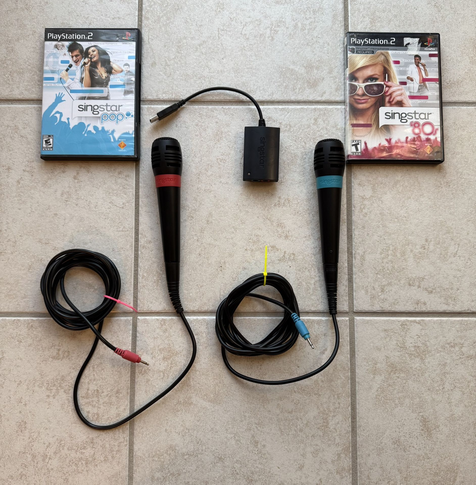 SingStar Bundle. 2 SingStar Microphones + 2 SingStar Games + USB Converter.