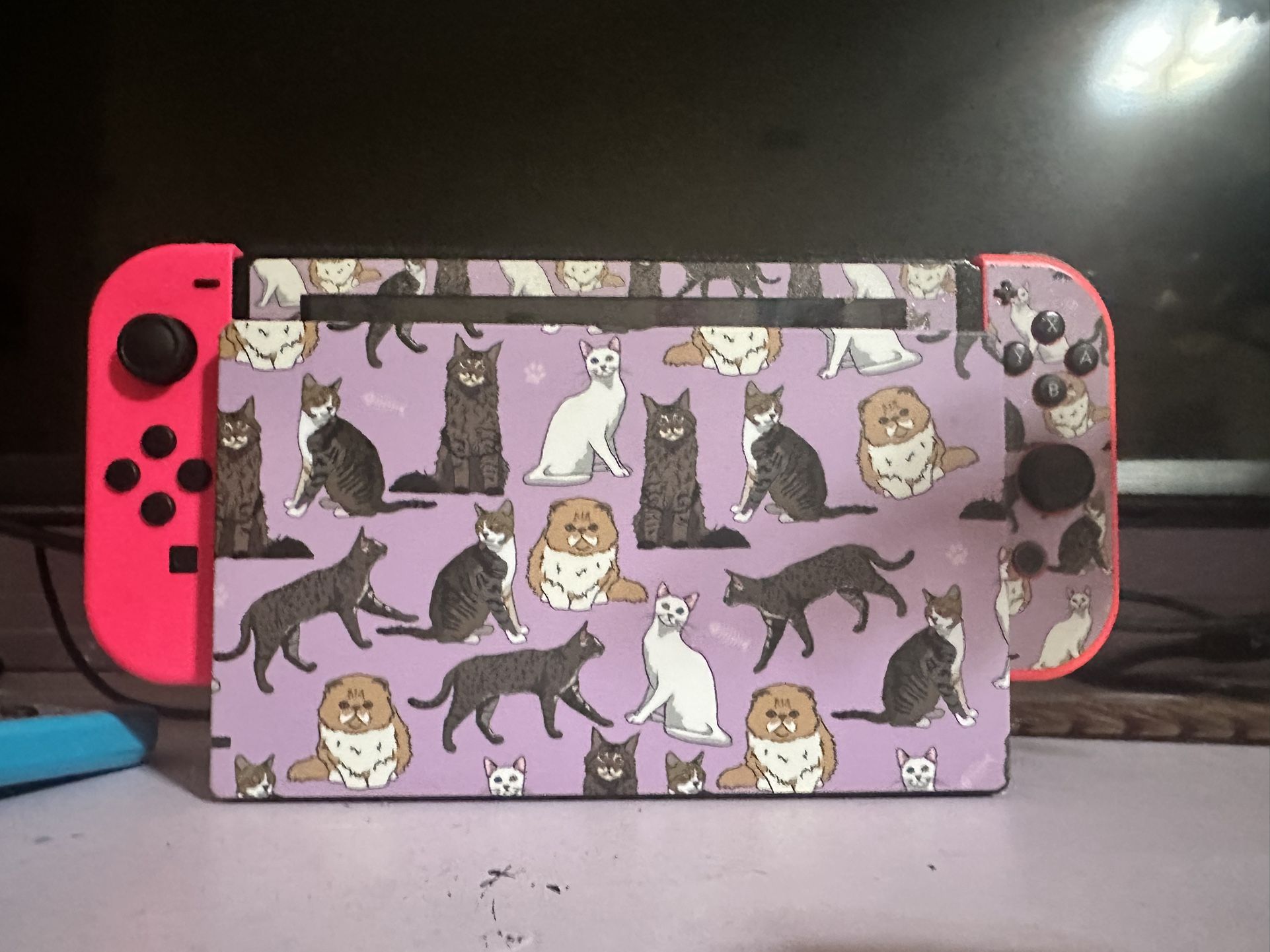 Nintendo Switch + four controllers + games