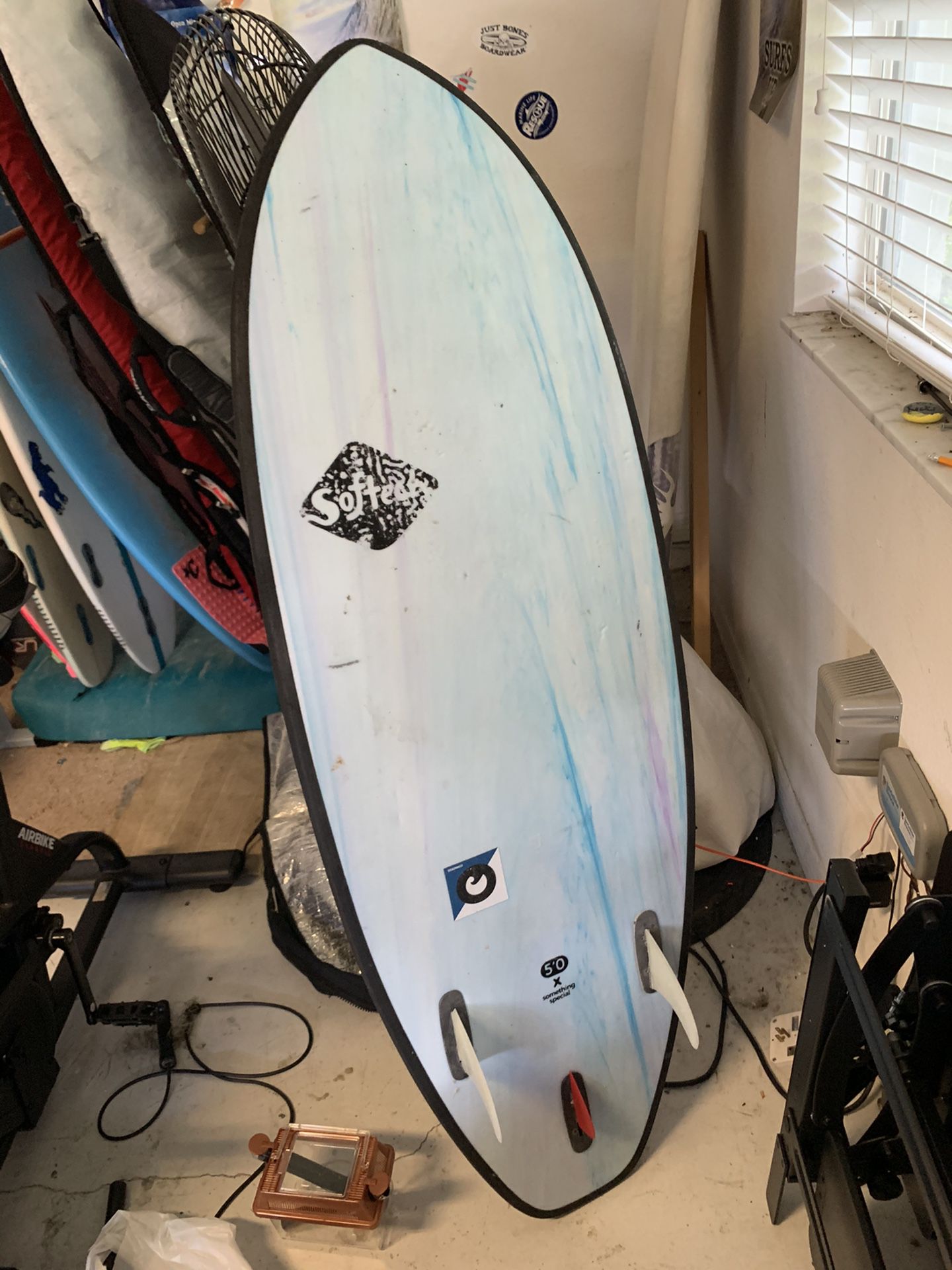 Soft Tec foam surfboard with fins