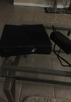 Xbox black 360 with two controllers and games good condition