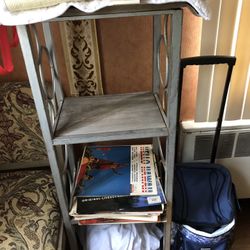 16” Across By 48” Tall Four Wooden Shelves And Crome Shelf