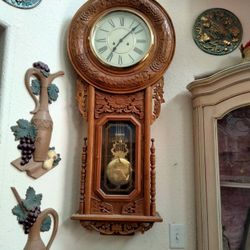 Pendulum Carved Wall Clock