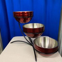 Cranberry Color Stainless Steel Bowls 9 sets available. Includes black spider base $45 per set