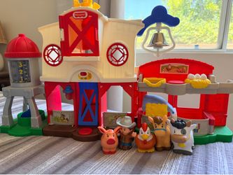 Fisher-Price Little People Caring for Animals Farm Electronic Interactive playset with Smart Stages Learning Songs for Toddlers