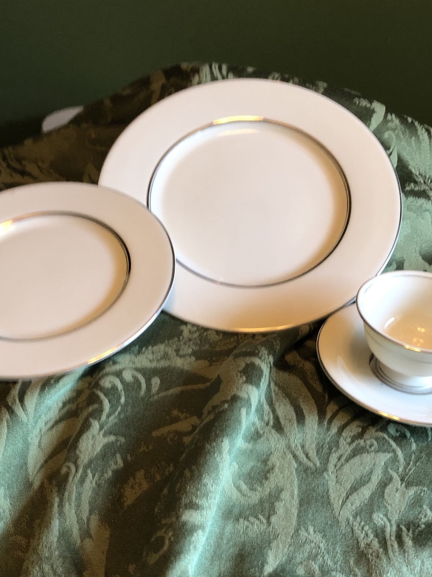 China by Castleton, made in USA. 6 dinner plates, 4 salad plates, 3 Bread & Butter plates, 2 cups and saucers. 15 pieces.