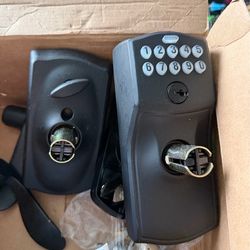 This Schlage Camelot Keypad Entry Lock features a brushed nickel finish.