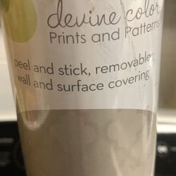 Brand new gray stick on wallpaper almost 28’ x 2’ wide