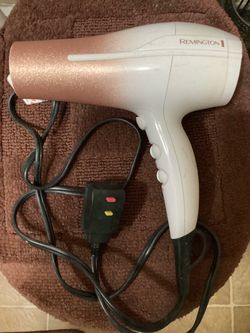 2 hair dryers, a straightener, and a curler