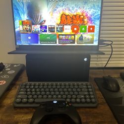 Xbox series x 1TB with a controller and chargeable batteries